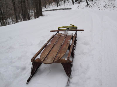 lightning guider sled on a snowy road