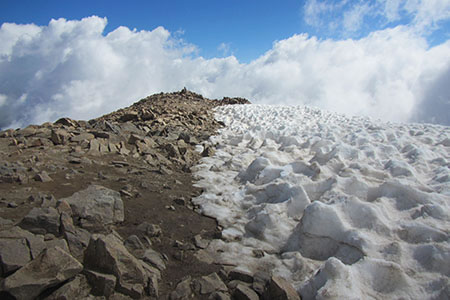 Looking at clouds across the summit of Mount Elbert