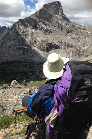 Hiker looking at Lizard Head Peak