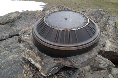 peak finder sitting on top of the rock outcrop