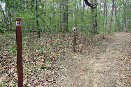 Mile 1 marker on the dirt road